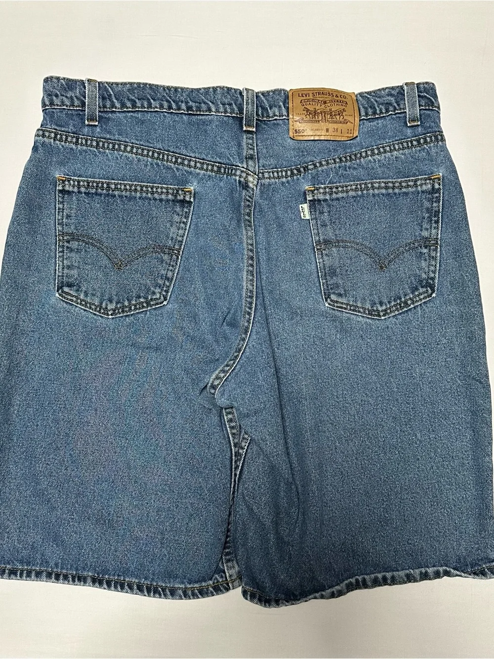 Vintage 1990’s Levi’s 550 Relaxed Fit White Tab Jean Shorts 38x11